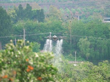 从“一两百人”到“十个人”：雁江丘陵地上的飞防队