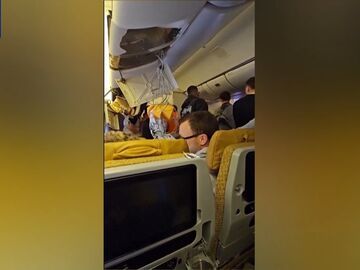新航客机事故致一人死亡 画面显示飞机上一片狼藉