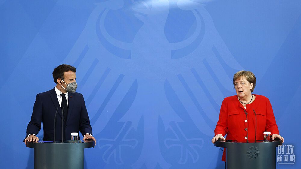 △2021年6月18日，默克尔在柏林会见了马克龙。他们共同表示，目前还不能过早宣告疫情结束。（图/视觉中国）
