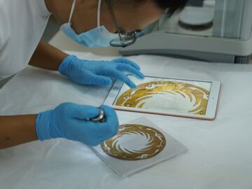 借展国博2个多月后 太阳神鸟金饰“飞”回成都入库保养