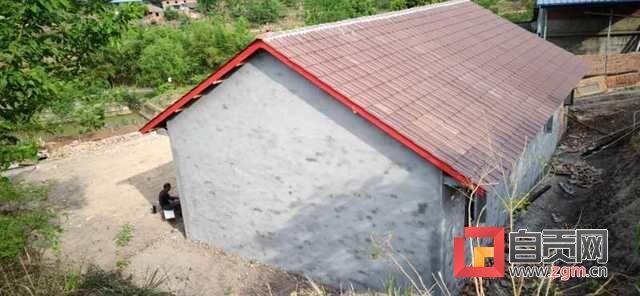 余翠榮鞏固提升后的房屋.jpg