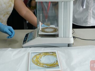 借展国博2个多月后 太阳神鸟金饰“飞”回成都入库保养